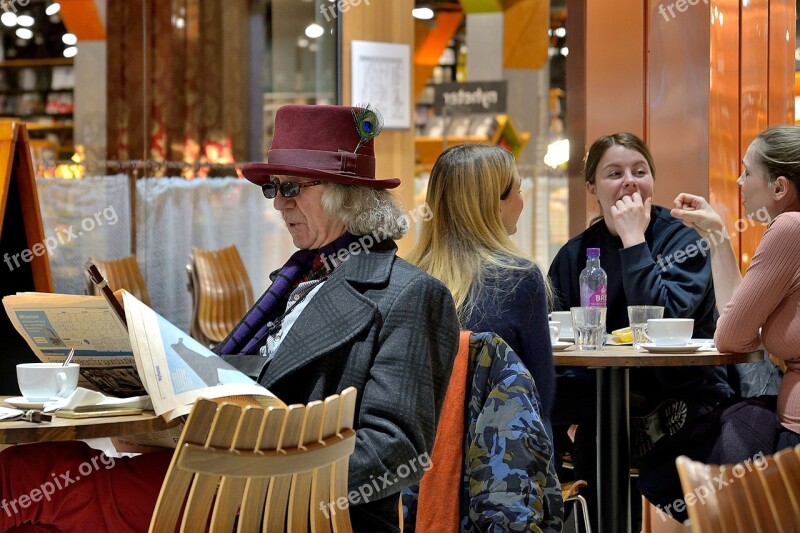 Man Reading Newspaper People Sitting