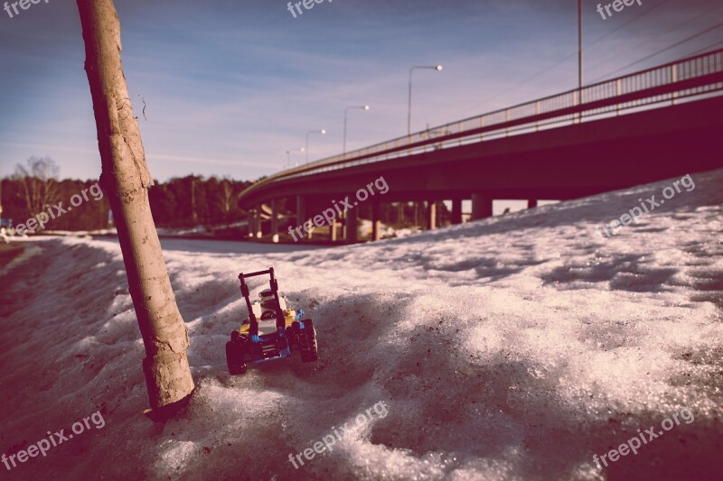 Lego Toy In The Snow Through Any Obstacles Cameraman