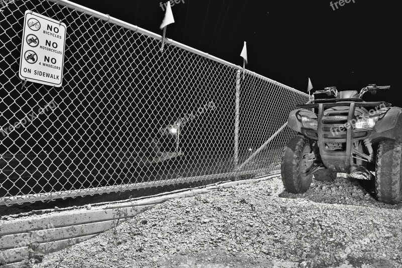 Chain Link Fence Quad Sign Black And White Vehicle