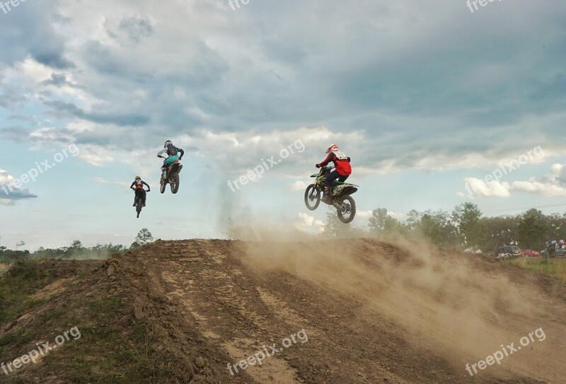 Motocross Race Dirt Bikes Ramping Riders