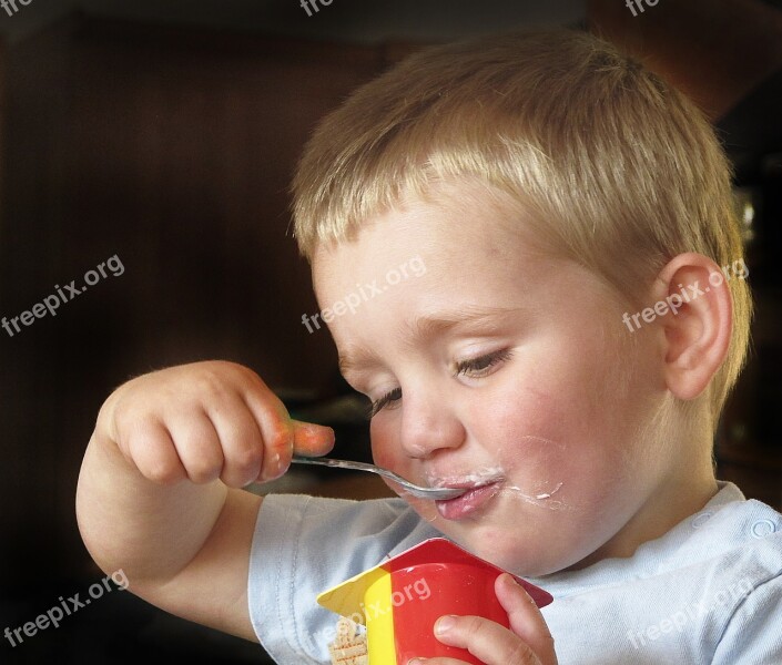 Boy Nibble Yogurt Spoon Face