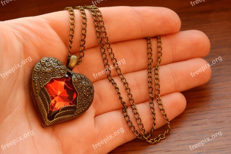 Heart In The Palm Of Your Hand Necklace With Winged Heart Heart In Hand Winged Heart Red Heart