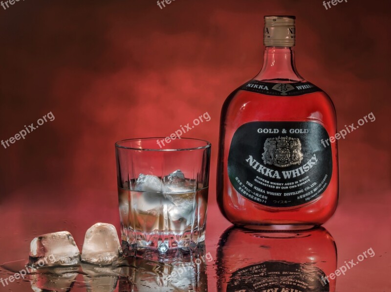 Whiskey Ice Glass Bottle Red Background