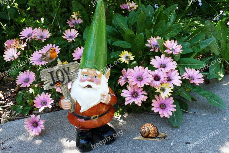 Gnome In Garden With Robin Free Photos