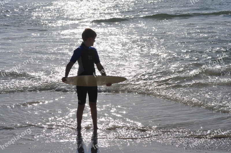 Boy Beach Sunset Skimboard Waves