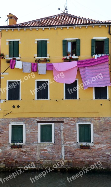 Laundry Clothes Line House Facade Purple Yellow