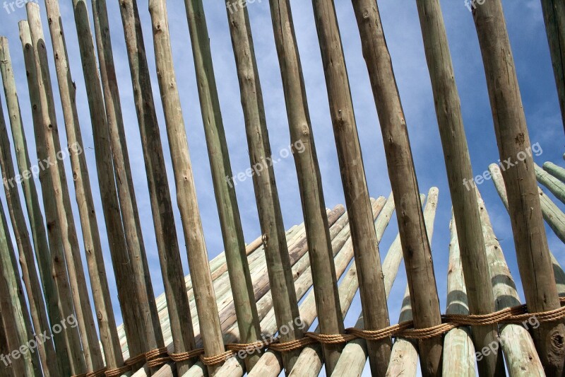 Close Up Of Pole Structure Sculpture Wood Beams Intersecting