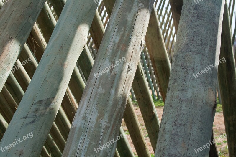 Close Up Of Pole Structure Sculpture Wood Beams Intersecting