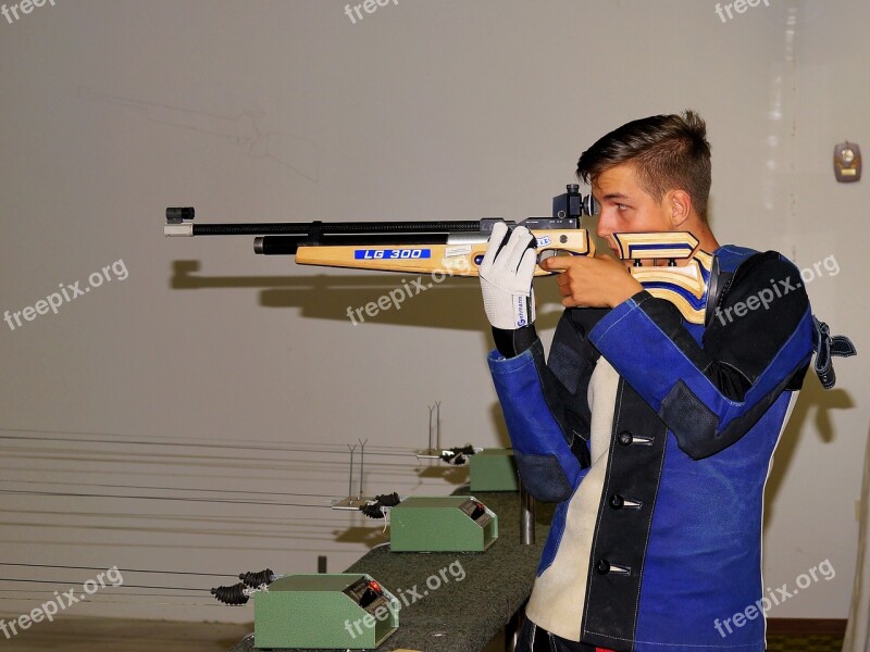 Young Man Sport Shooting Luftggewehr Concentration Protective Clothing