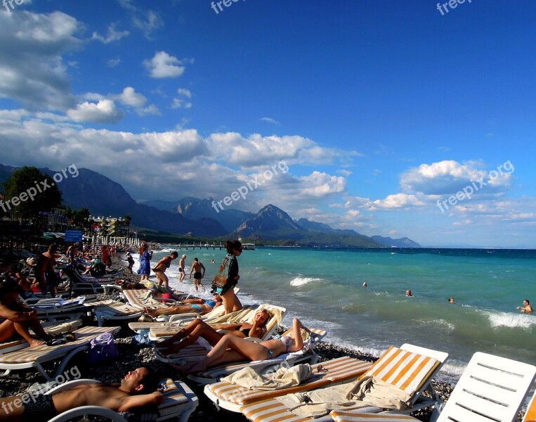 Sea Beach People Sunbathing Pebbles