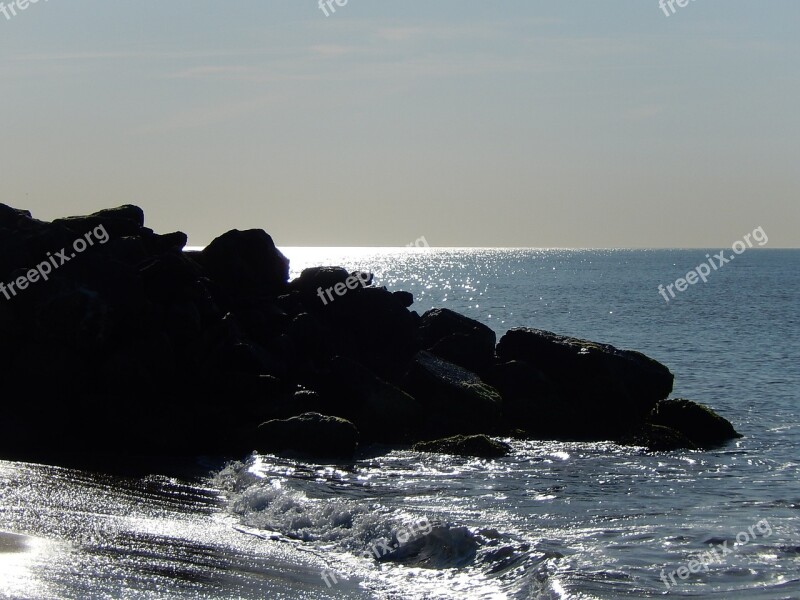 Rocks In The Edge Of The Sea Calm Free Photos