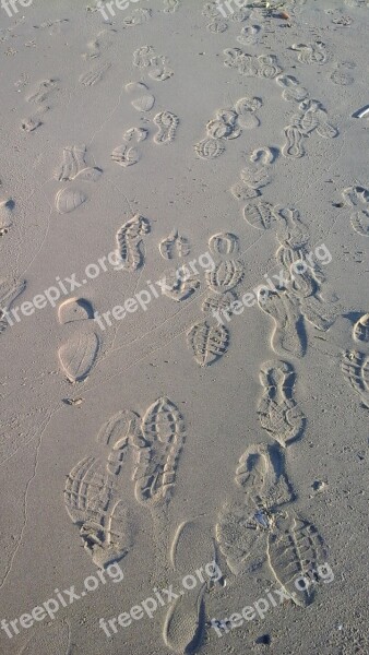 Footprints Sand Busy Beach Free Photos