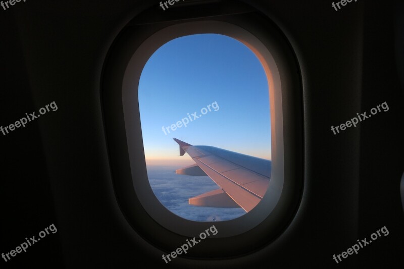 Flying Aircraft Window Wing Clouds