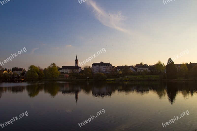 Sunset Church Mirroring Water Steeple