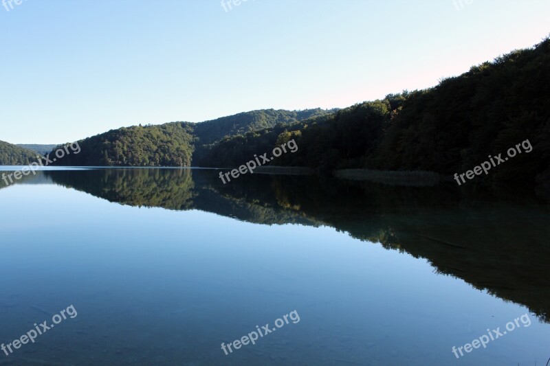 Lake Mirroring As Smooth As Glass Water Reflection