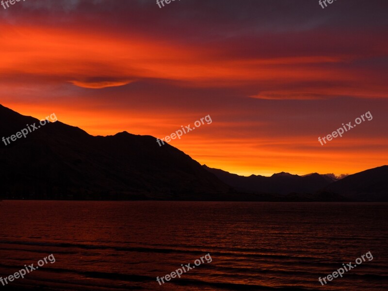 Sunset Lake Orange Glow Silhouette