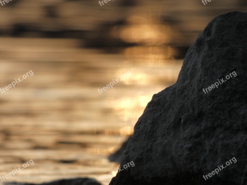 Bokeh Stone Sunset Evening Water