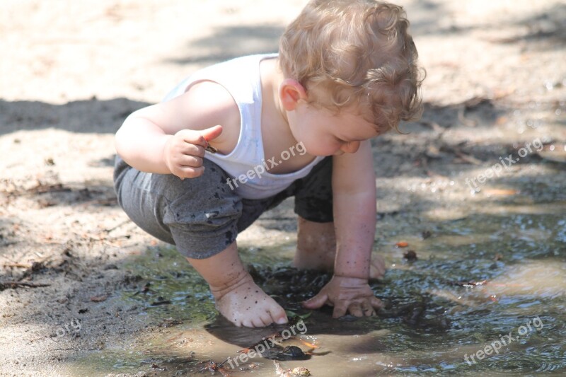 Child Mud Puddle Play Fun