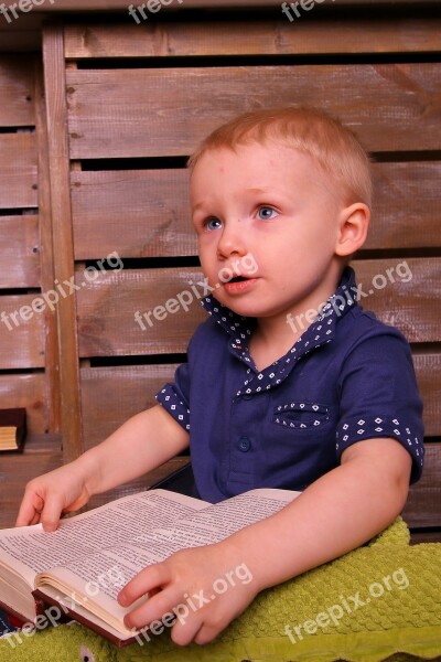 Boy Reading With A Book Baby Book