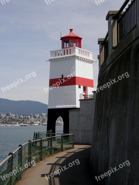 Lighthouse Seawall Sea Ocean Landmark