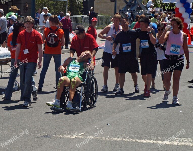 Marathon Race Runner Exhausted Wheelchair