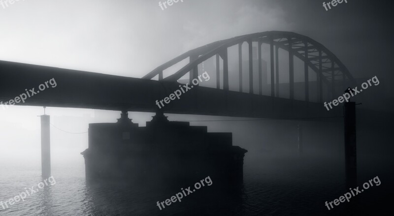 Bridge Water River Against Light Fog