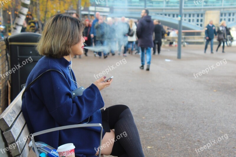 Young Woman Sitting Bench Smoking London