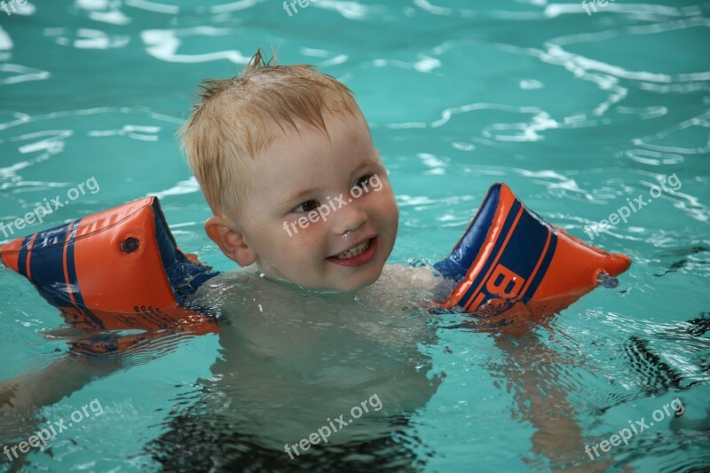 Child Swimming Water Wings Learn Float