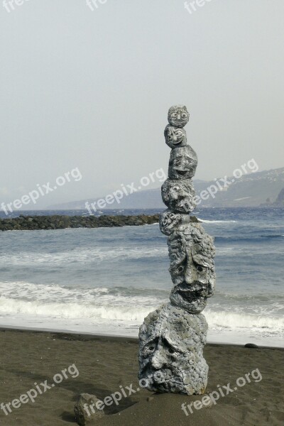 Figure Stones Faces Stack Sea