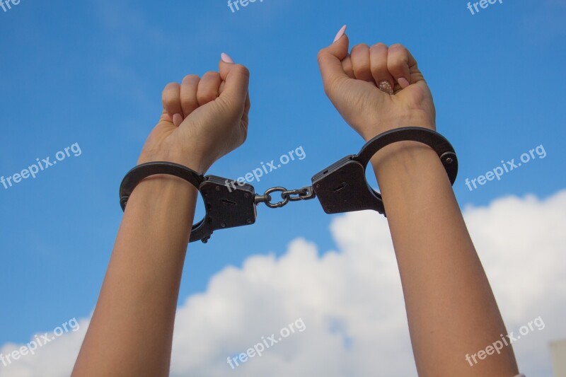 Sky Hands In Handcuffs Female Hands Manicure Being Shackled By Handcuffs