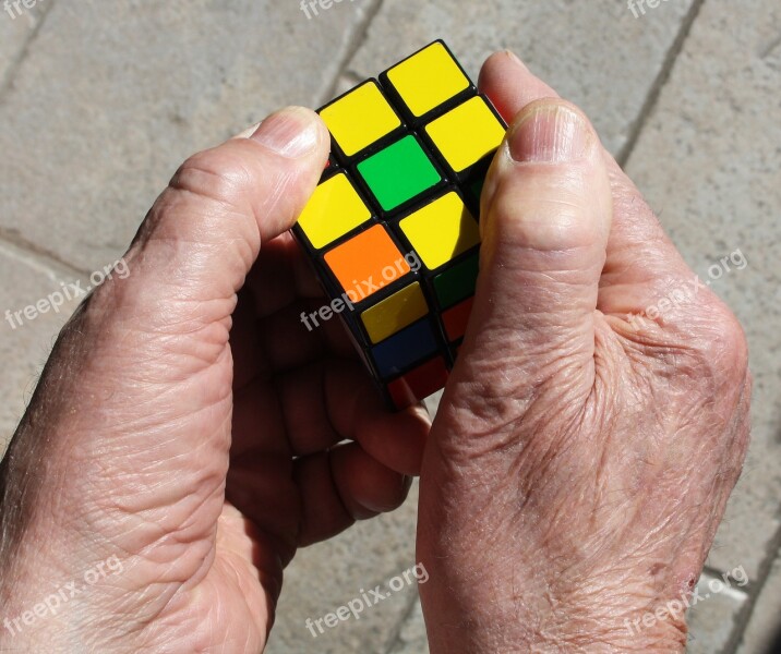 Rubik's Cube Hands Yellow Cube Game