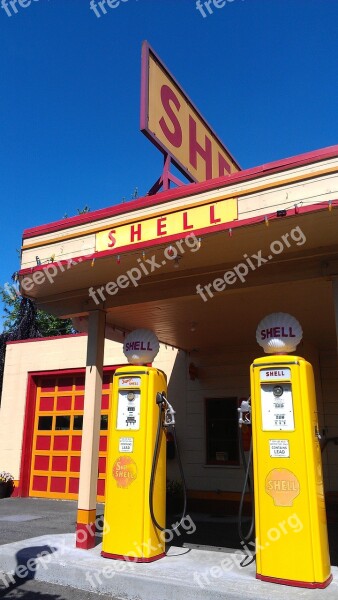 Vintage Shell Gas Station Yellow Gas Pump Blue Sky