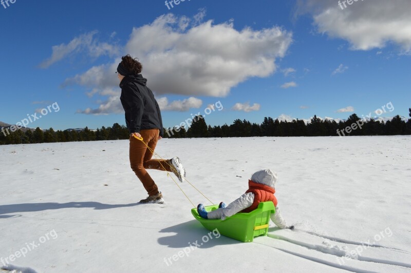 Woman Child Baby Snow Clouds