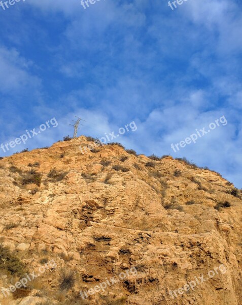 Cliff Sky Pylon Scenic Clouds