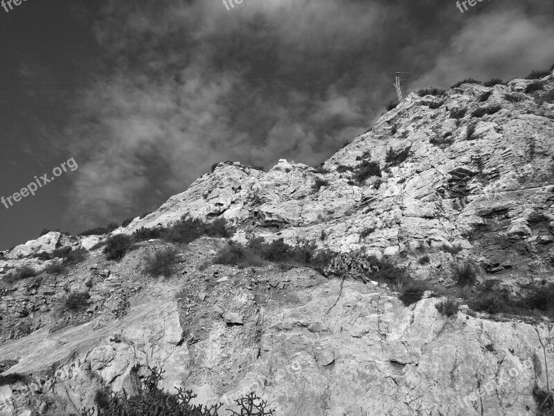 Cliff Sky Pylon Scenic Clouds