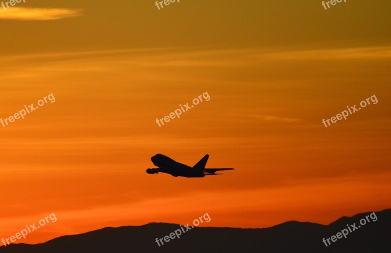 Jetliner Flying Silhouette Colorful Sky