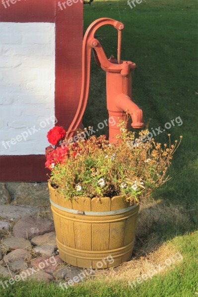 Old Water Pump Painted Maroon No Longer Functional Used As Decoration Beautiful