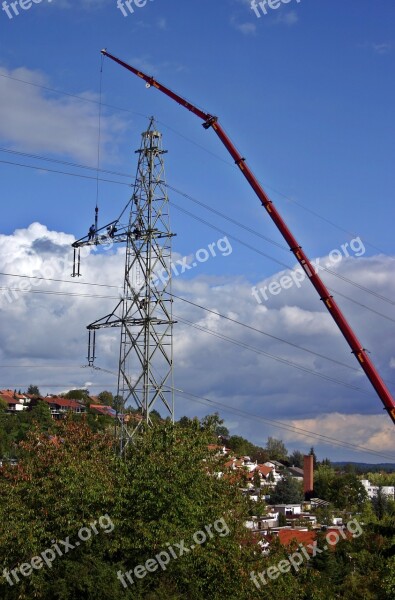 Power Line Maintenance Workers Repair High Voltage