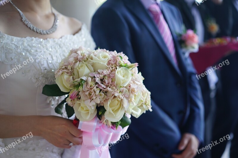 Holding Flowers The Groom Ring Bride Hand