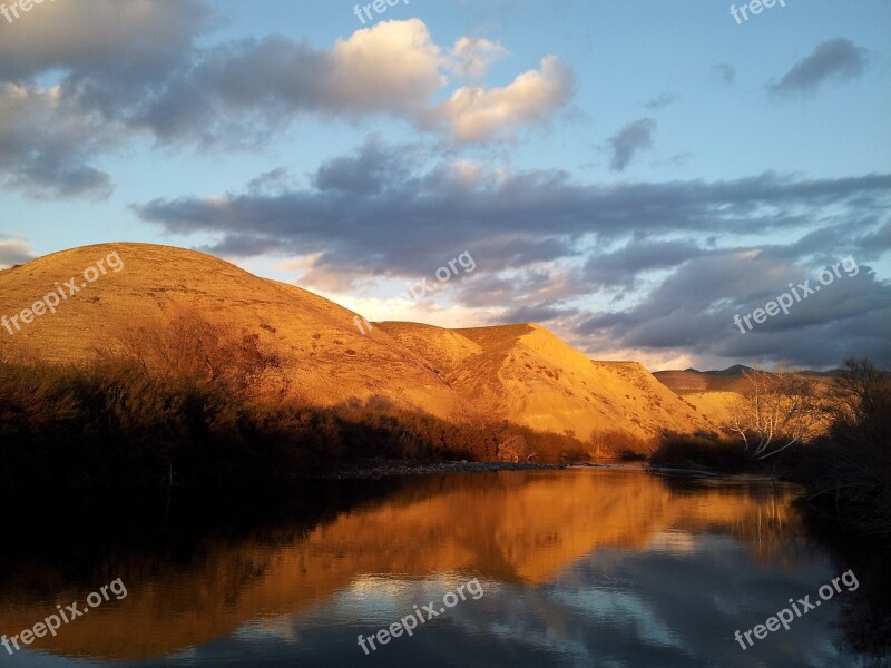 Sun Setting Mountain Water River