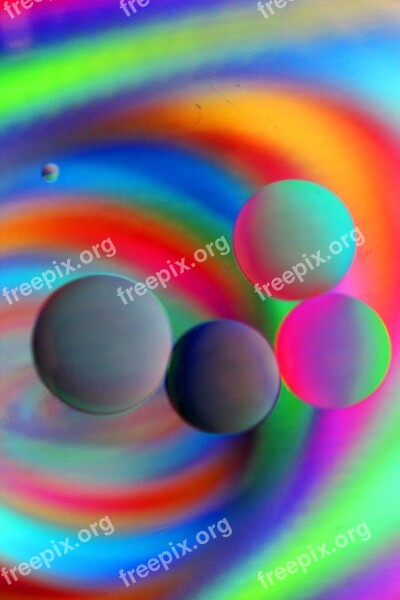 Artistic Oil And Water Floating Colorful Rainbow