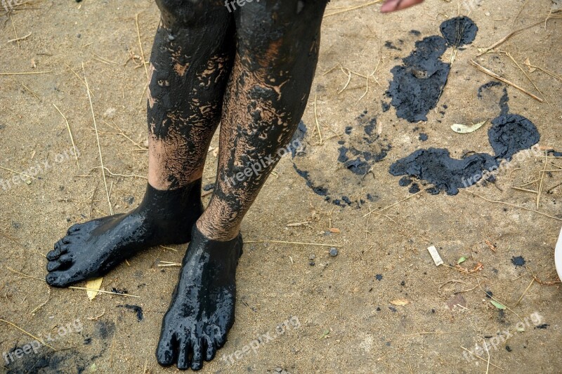 Feet Black Oil Mud Close Up