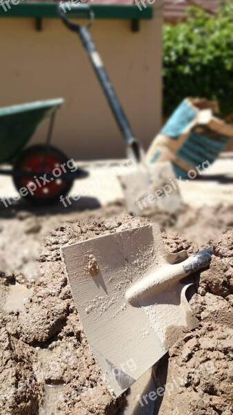 Building Renovations Cement Wheelbarrow Shovel