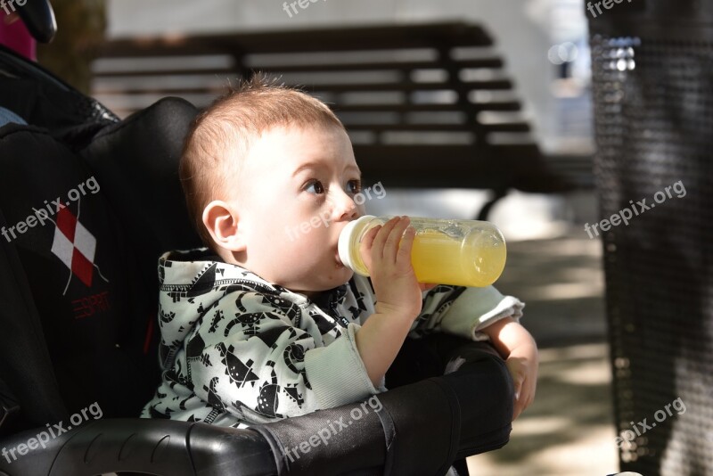 Baby Toddlers Bottle Orange Juice Big Eyes