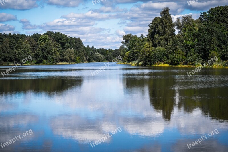 Lake Clouds Mirroring Forest Trees