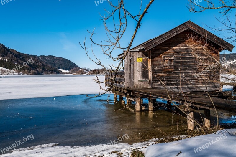 Lake Boat House Ice Water Sky