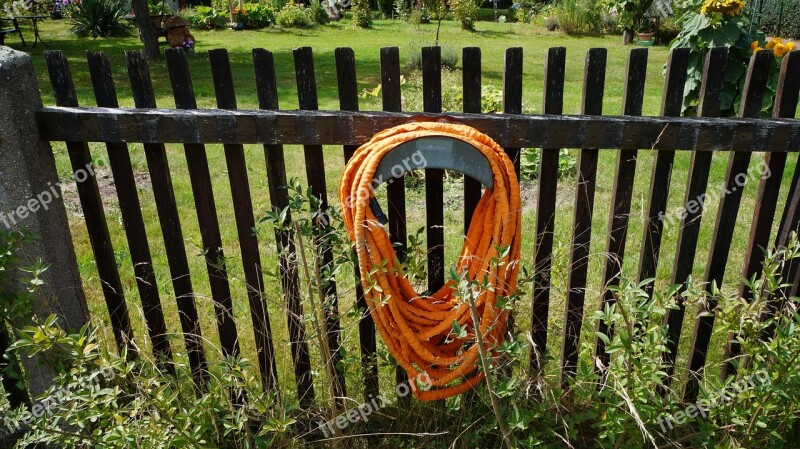 Garden Hose Fence Casting Water