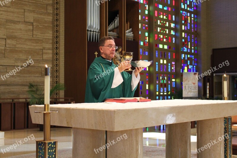 Priest Catholic Mass Host Chalice