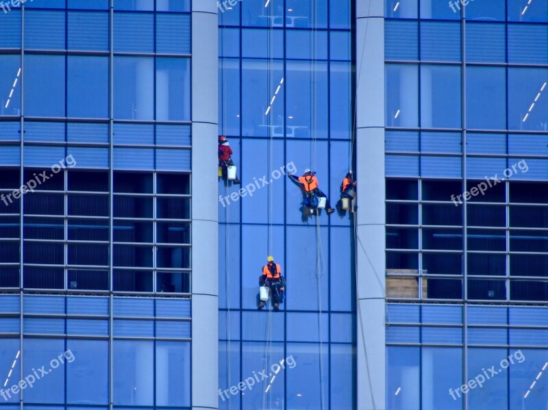 Window Washer Abseiling Cleaning Glass Building