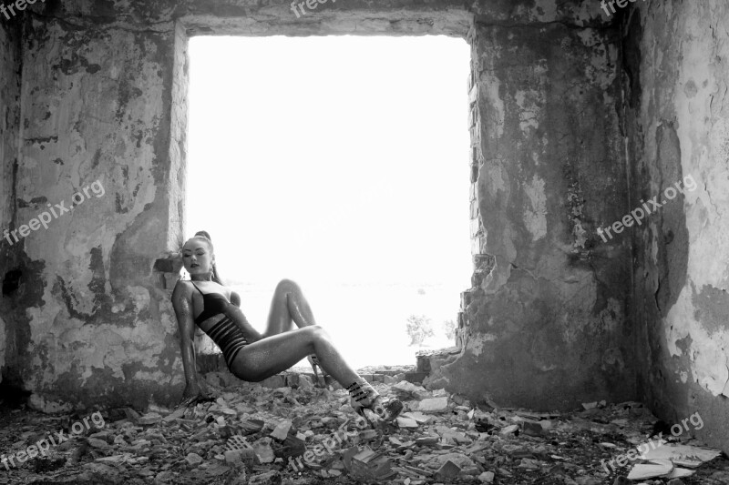 Girl Forms Sensual Ruins Swimsuit